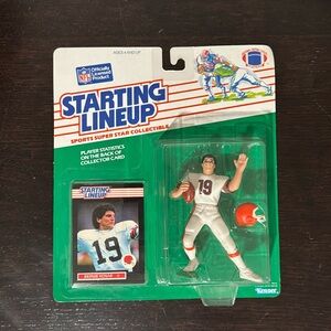 1989 Bernie Kosar Starting Lineup figure and card. New. Very good condition.